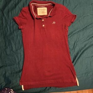 Aeropostale maroon polo in size M.